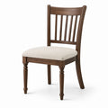 Silla de comedor de madera con asiento de poliéster crema
